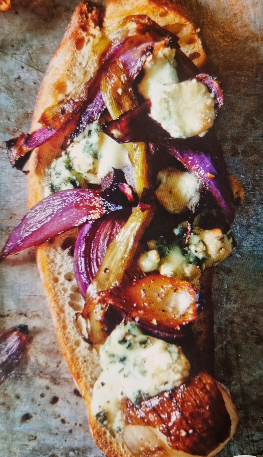 Roasted red shallots with gorgonzola bruschetta — appetizer station.