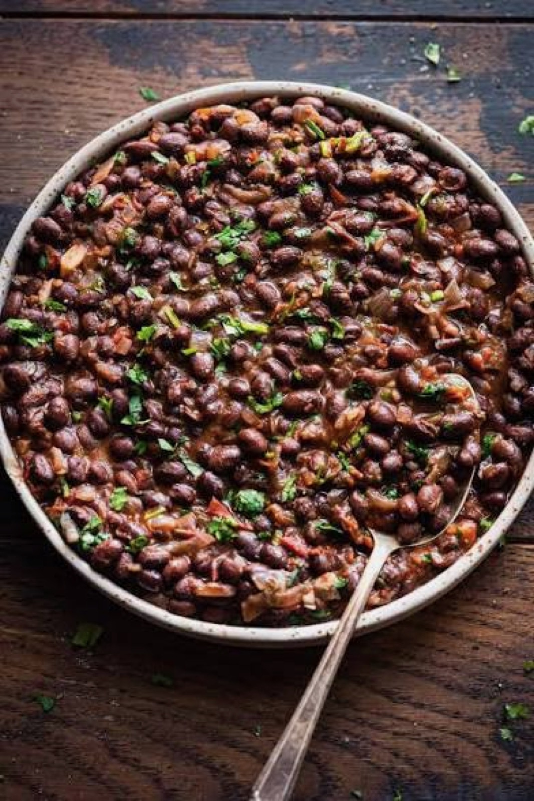 Molí black heirloom beans with fresh cilantro — The Asado table.