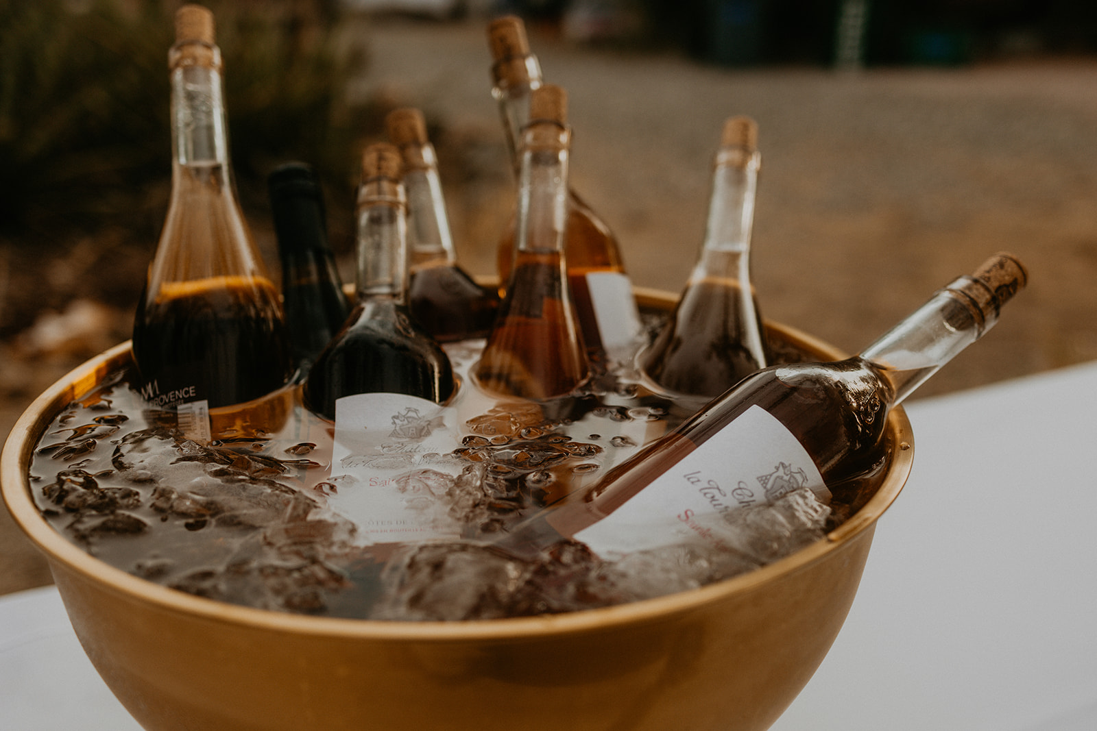 A golden bowl of Provence rosé chilling on ice at a Net Zero Ranch bar.
