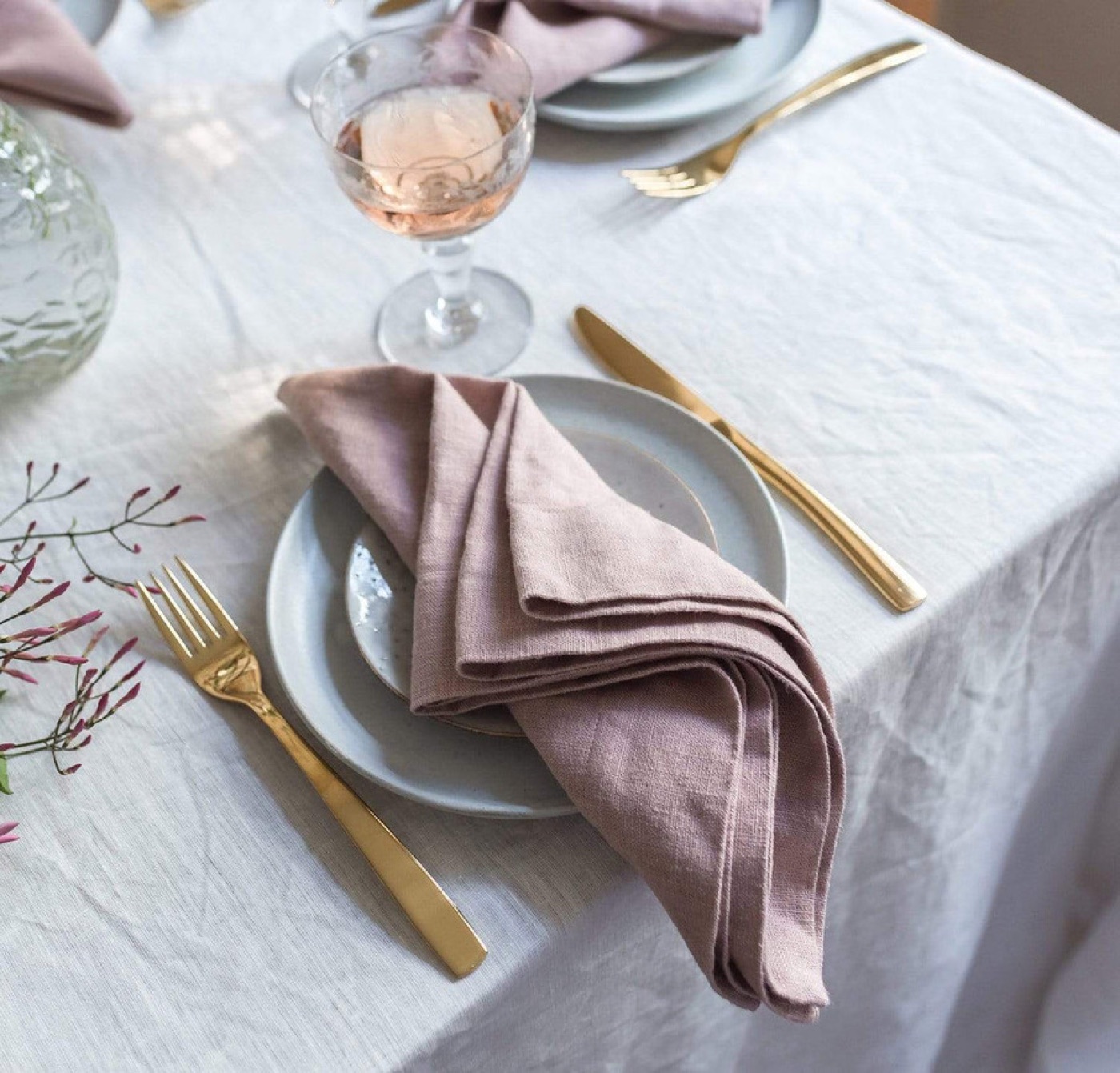 Styled photo representing Net Zero Ranch's tabletop and place-setting design.