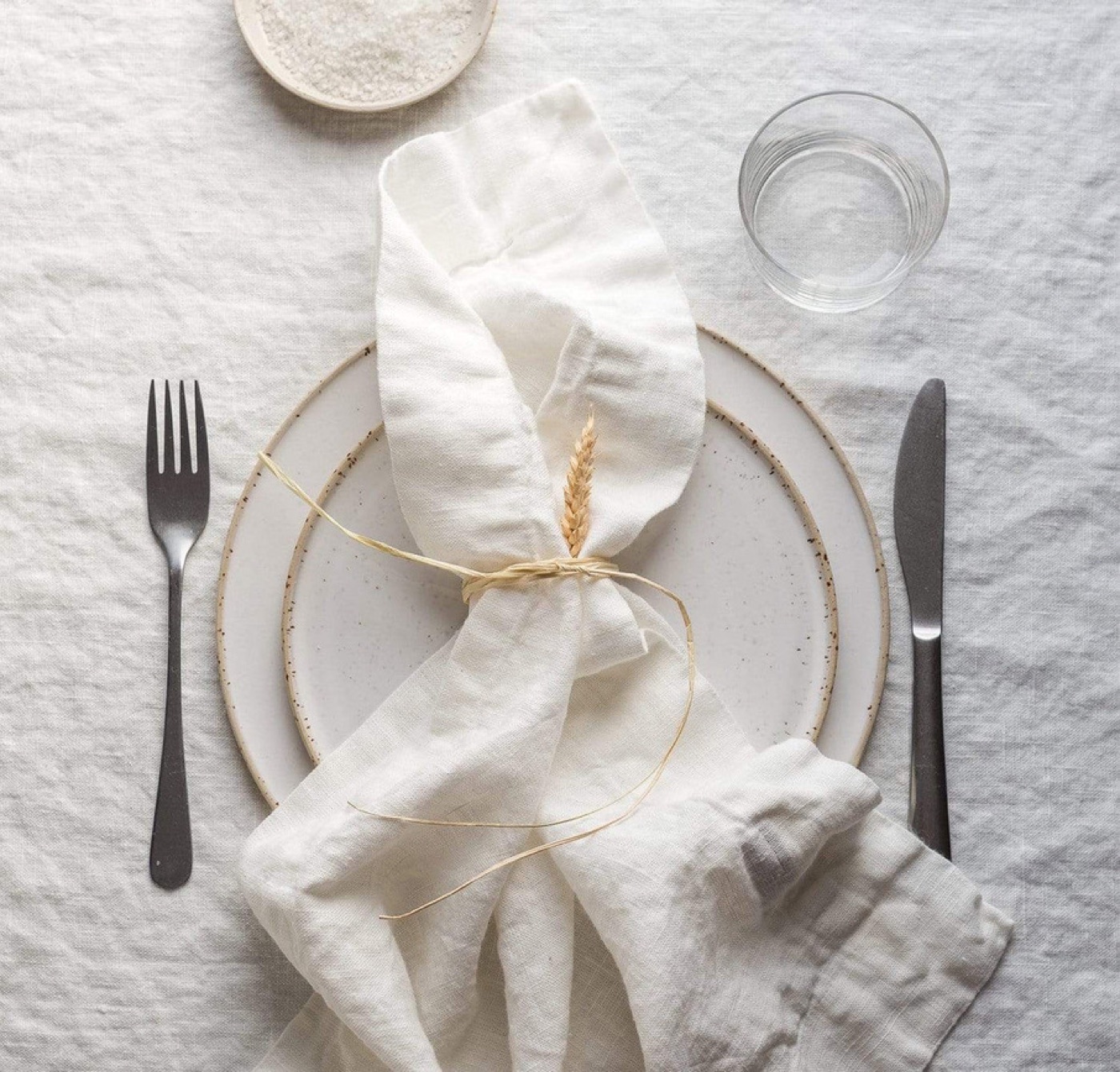 Styled photo representing Net Zero Ranch's linen and tabletop styling.