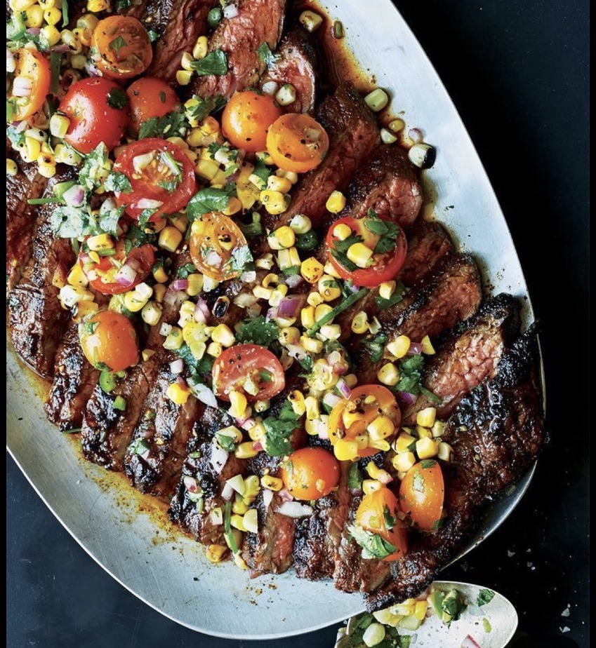 Wood-fired sliced steak with charred corn and cherry-tomato salsa — Net Zero Ranch.